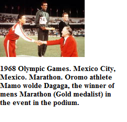 1968 Olympic Games. Mexico City, Mexico. Marathon. Oromo athlete Mamo wolde Dagaga, the winner of mens Marathon (Gold medalist) in the event in the podium.
